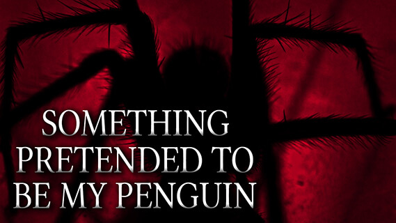 The black silhouette of a giant spider.